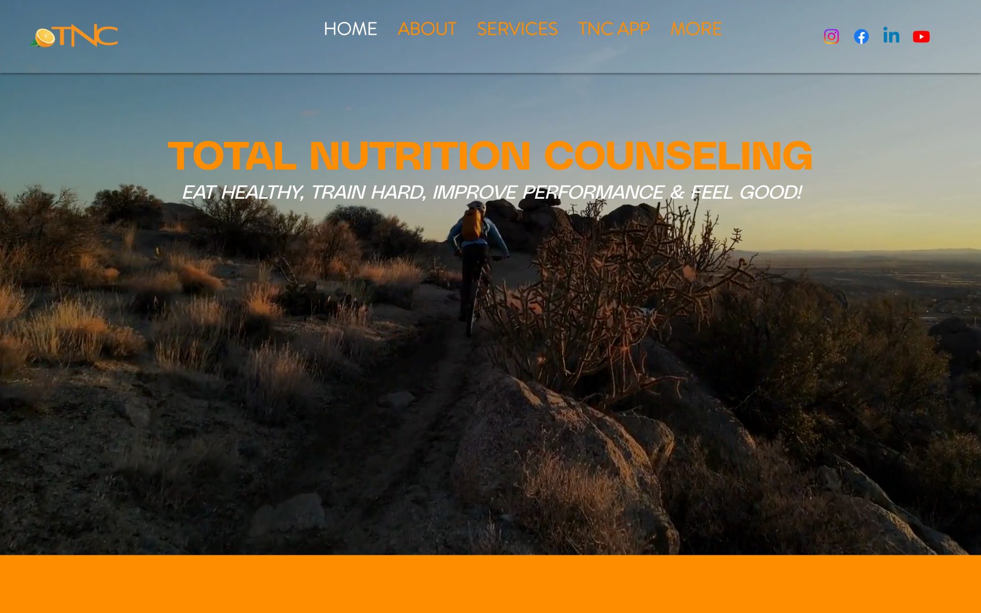The Total Nutrition Counseling homepage, over a mountain-bike trail at sunset